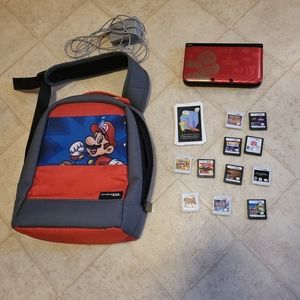 Nintendo 3DS with Mario case, charger, and 11 games